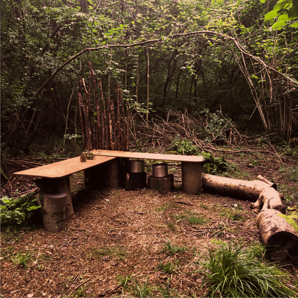 Child running through the woods at Wildlings Nature Play